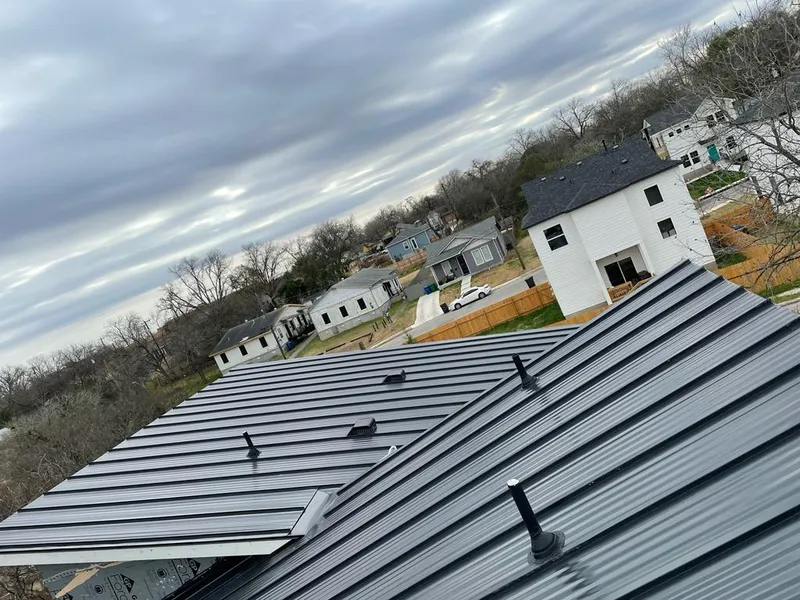 Standing seam metal roof panels with vents for Skylight Repair in Colorado Springs